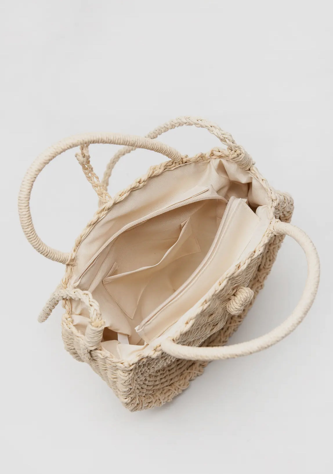 Ivory rattan rounded purse