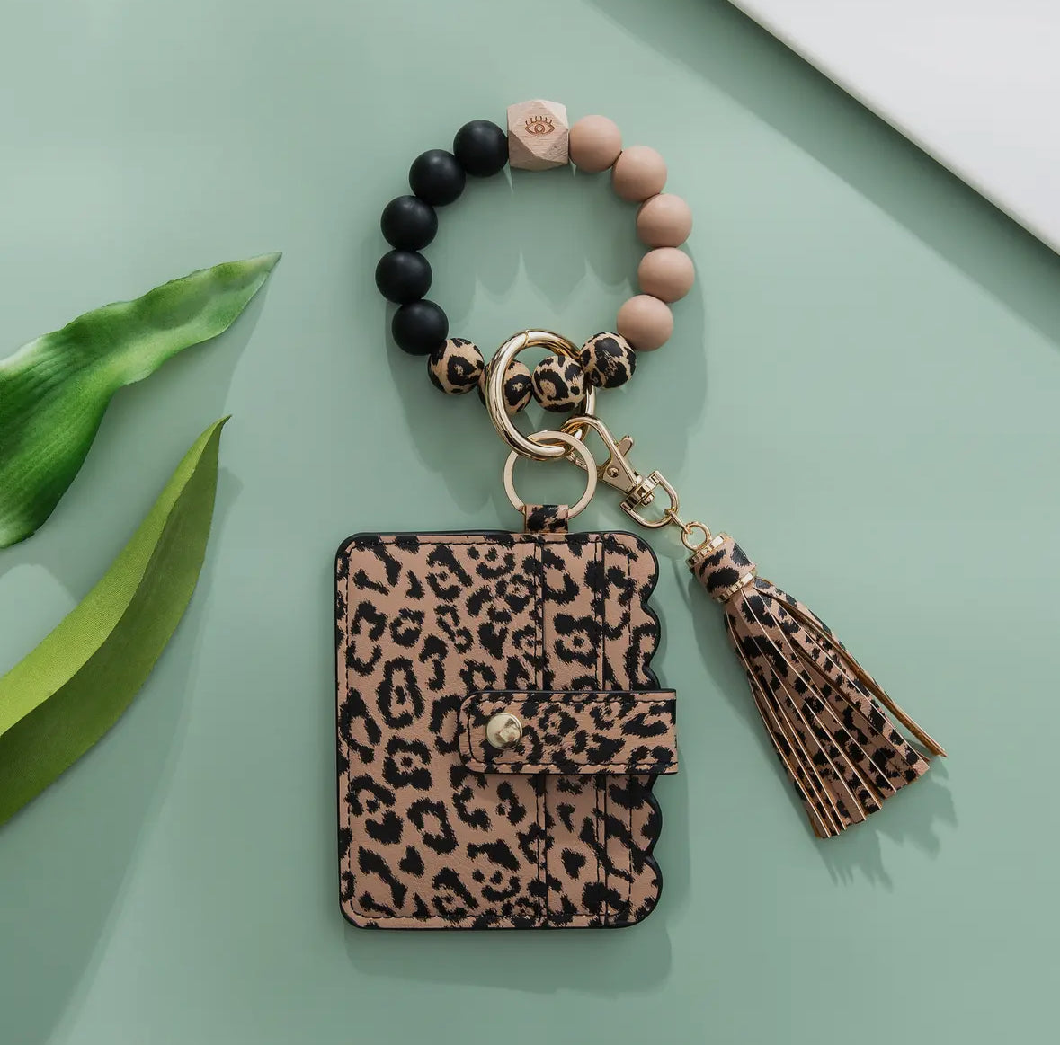 Triple card cheetah tassle