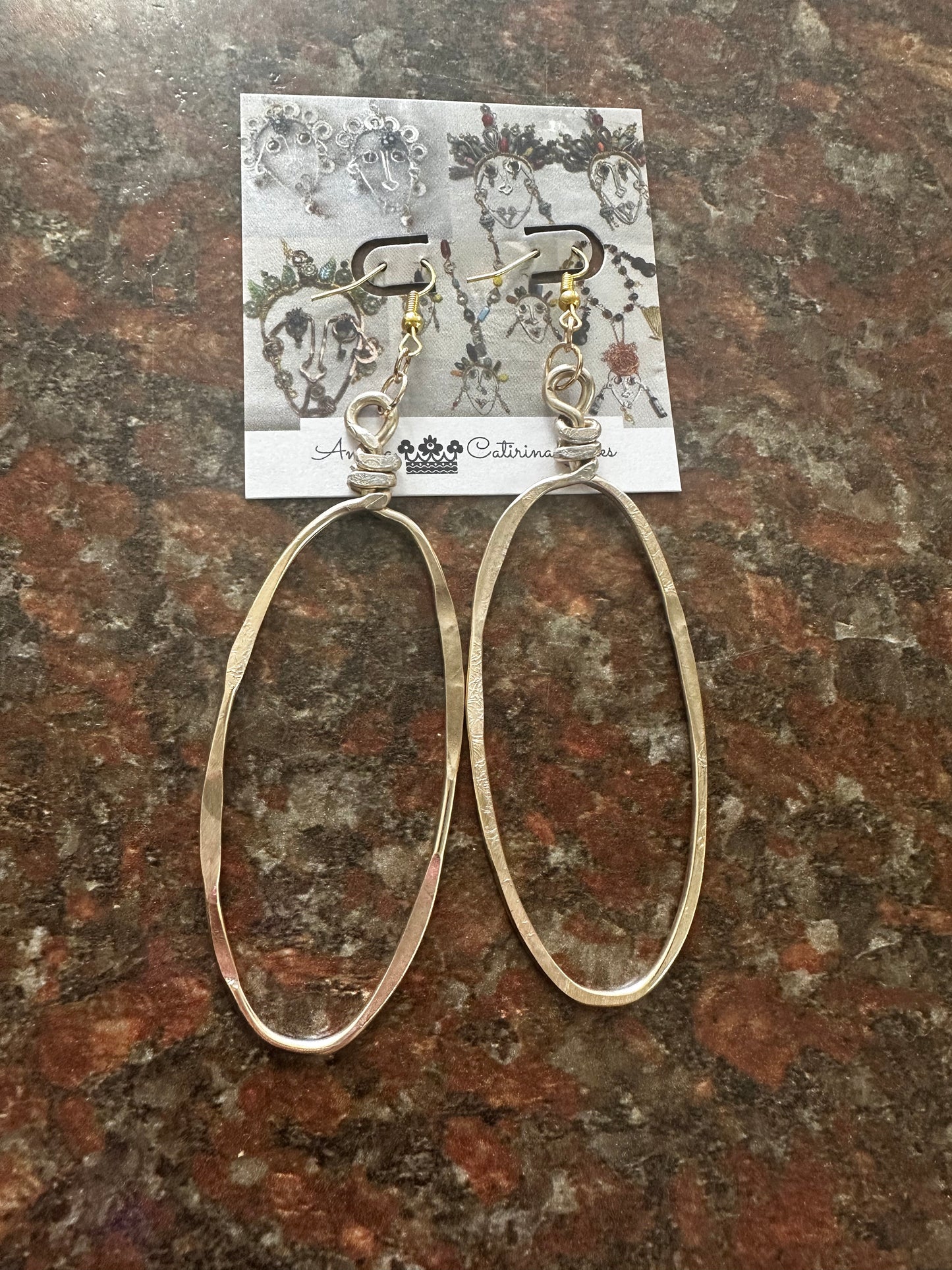 Large gold oblong hoops